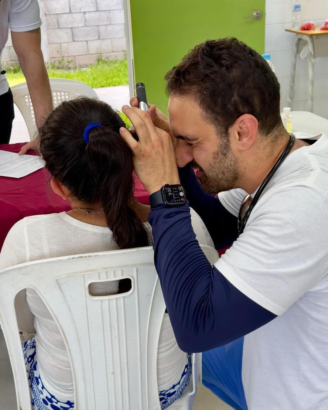 A volunteer doctor at a Tarbiyat medical campaign